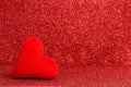 Valentine heart on red glitter background. Valentine\'s Day concept copy space