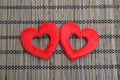 Valentine heart shape on Wooden bamboo mat texture. Royalty Free Stock Photo