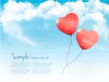 Valentine heart-shaped baloons in a blue sky with clouds. Royalty Free Stock Photo