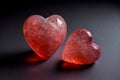 Valentine hearts from red natural crystal. A pair of stones in the shape of a heart