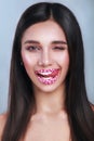 Valentine Hearts sweet makeup. Valentine`s Day make-up lips with pink hearts sugar sprinkles. Kiss on the Lips Royalty Free Stock Photo