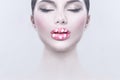 Valentine Hearts sweet makeup. Valentine`s Day make-up lips with pink hearts sugar sprinkles. Kiss on the Lips. Makeup Royalty Free Stock Photo