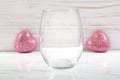 Valentine Inspired Stemless Wineglass Mockup with Glittery Pink Hearts