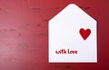 Valentine letter envelope on red background. Royalty Free Stock Photo