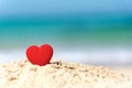 Valentine and Marry Concept. Sigle red hearts couple lovers for married on the sand summer beach,