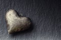 Valentine Metal heart on a granite board. Valentine's two silver heart with ornaments. Heart of Love Valentines and wedding Day. Royalty Free Stock Photo