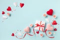 Valentine or mother day festive composition with gift or present box, rose flowers and red pink hearts Royalty Free Stock Photo