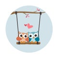 Valentine owls in love in a swing