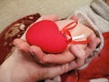 Valentine red heart in woman and man hands Royalty Free Stock Photo