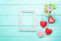 Valentine`s accessories with heart shapes on blue wooden table. Mother day. Copy space Royalty Free Stock Photo