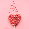 Valentine`s card. Lollipops candy as heart on pink. Funny concept