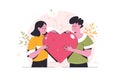 Young man and woman lover hugging big heart. Romantic lovers for valentine\'s day. Family. In love.