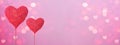 Valentine`s Day abstract background in pink colors and red heart balloons, isolated on bright texture - Hearts bokeh / Love Royalty Free Stock Photo
