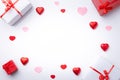 Valentine`s Day background. .with gifts and hearts, in red and white, top view. San valentin and love concept Royalty Free Stock Photo