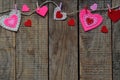 Valentine`s Day background with handmade felt hearts, clothespins. Valentine gift making, diy hobby. Romantic, love concept. Happ Royalty Free Stock Photo