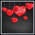 Valentine`s Day background of Happy Valentine`s Day text on red  hearts hanging with square framed. Royalty Free Stock Photo