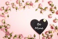 Valentine`s Day background with heart-blackboard, small roses an Royalty Free Stock Photo