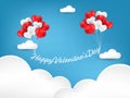 Valentine`s Day background of red heart shape balloons hanging Happy Valentine`s Day text on blue sky with white clouds. Royalty Free Stock Photo