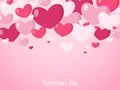 Valentine`s Day background of hearts in pink tones on pink background with Happy Valentine`s Day text and your copy space. Royalty Free Stock Photo