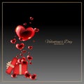 Valentine`s day background of red hearts floating from red gift box with gold ribbon on black background with gold frame. Royalty Free Stock Photo