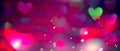 Valentine`s Day Background. Holiday Blinking Abstract Valentine Backdrop with Glowing colourful Hearts. Heart Shape Bokeh