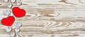 Valentine`s day background. Homemade hearts made of wood on a wooden background. Heart is a symbol of love . Royalty Free Stock Photo