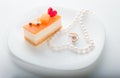 Valentine`s day background, Love concept, two heart in pearl necklace on saucer