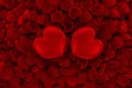 Valentine`s day background. Many red hearts and pair of big brigth hearts on top