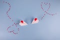 Valentine`s Day background. Paper planes flying with the heart shapes. Love message
