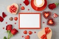 Valentine`s day background with photo frame, coffee cup, heart shape chocolate, candles and gift boxes