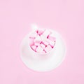 Valentine`s day background with pink marshmallow hearts in a cup Royalty Free Stock Photo