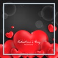 Valentine`s Day background of red heart around frame with copy space on black background. Royalty Free Stock Photo