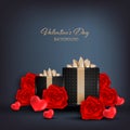 Valentine`s Day background of red heart, red roses and black gift box on black background with copy space. Royalty Free Stock Photo