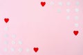 Valentine`s Day background. red hearts and snowflakes on pink background. Valentines day concept. Flat lay, top view, copy space Royalty Free Stock Photo