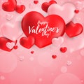 Valentine`s Day background of pink hearts and and red hearts with Happy Valentine`s Day text on pink background with copy space. Royalty Free Stock Photo