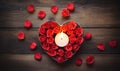 Valentine's Day background with red roses and candles on wooden table