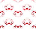 Seamless pattern with red hearts formed with the little hearts on a white background