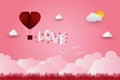 Valentine`s day balloons in a heart shaped flying over grass view background, paper art style. vector illustrator Royalty Free Stock Photo