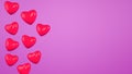 Valentine's day banner background. Red 3d hearts on a blank pink backdrop. Copy space for text Royalty Free Stock Photo