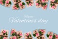 Valentine`s day banner.postcard favorite.Festive wreath of roses decoration with gifts and pink roses on a blue background. Royalty Free Stock Photo