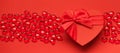 Valentine`s Day banner with red hearts and festive box. Royalty Free Stock Photo