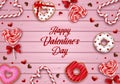 valentine\'s day banner with sweets on wooden background. valentine poster with donuts, candy canes and lollipops