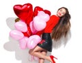 Valentine`s Day. Beauty girl with colorful air balloons having fun Royalty Free Stock Photo