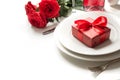 Valentine`s day or birthday dinner. Elegance table setting with champagne and red rose Royalty Free Stock Photo