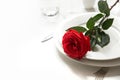 Valentine`s day or birthday romantic dinner. Romantic table setting with red rose Royalty Free Stock Photo