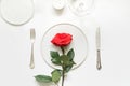Valentine`s day or birthday romantic dinner. Romantic table setting with red rose Royalty Free Stock Photo