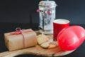 Valentine`s Day, biscuits and heart-shaped balloon, coffee cup a Royalty Free Stock Photo