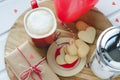 Valentine`s Day, biscuits and heart-shaped balloon, coffee cup a Royalty Free Stock Photo