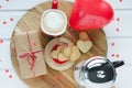 Valentine`s Day, biscuits and heart-shaped balloon, coffee cup a Royalty Free Stock Photo