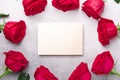 Valentine`s day blank card with red rose flowers on stone background. Valentines day mockup